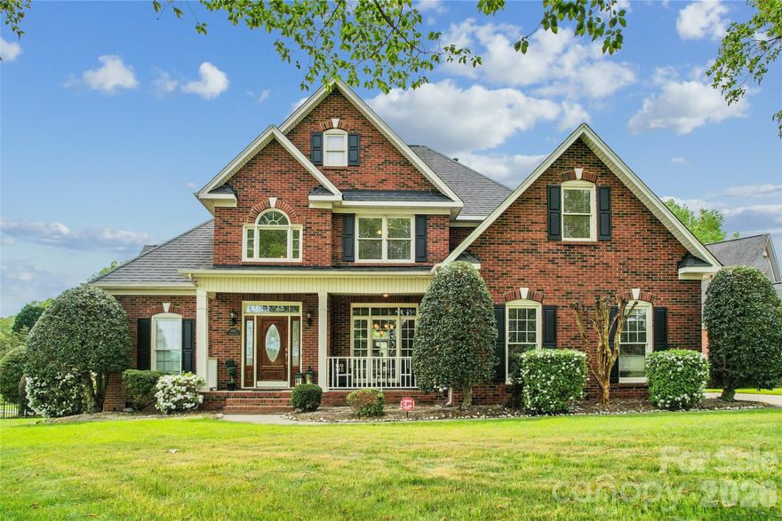 JUST REDUCED $15K!  This stunning full-brick retreat in the heart of Shannamara offers the perfect blend of classic style and resort-style living. Overlooking the lush fairways of the community golf course, this home is a rare find in Union County’s top-rated school district.
Main Level Living & Entertainment
Step from the rocking-chair front porch into a soaring two-story foyer and a sun-drenched, open-concept great room. The gourmet kitchen features granite countertops, stainless steel appliances, and a bar-top island that flows seamlessly into the dining area—ideal for hosting. For ultimate privacy, the primary suite on main boasts a five-piece spa bath with a garden tub and walk-in shower. A versatile second guest bedroom and full bath are also located on the main floor, along with a dedicated laundry room with built-in cabinetry.
Space to Grow
Upstairs, you’ll find two additional spacious bedrooms plus a large bonus room that easily serves as a 5th bedroom, home office, or media room. The clever Jack-and-Jill style bath features separate vanity areas to streamline busy mornings.
Your Private Oasis
The backyard is a true showstopper. Enjoy summer days in your fenced-in oasis, featuring a sparkling in-ground pool (with a recently replaced liner) and a sprawling deck. The manicured yard still offers plenty of green space for a play set or trampoline, all while enjoying serene golf course views.
Community Amenities
Shannamara living includes access to a clubhouse, tennis courts, playground, and public golf course—all with the benefit of low HOA fees and Union County taxes.