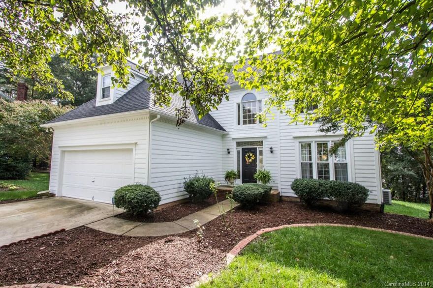 Beautiful 2 sty home w/ open floorplan. Lg Kitchen w/ granite ctrs, new tile flooring, lg breakfast bar & updated appliances overlooks great room w/ wood burning FP. Recent 10" ceramic tile in Kit & foyer, carpet, 2HVAC units, recently painted interior & exterior. Master Bedroom is spacious w/ oversized walk-in closet, MBath has dual vanities w/granite ctrs & jetted tub &sep. shower. Lovely landscaping w/ irrigation on sides, frt & fenced bkyard. Sunroom heated &cooled. Home warranty provided.