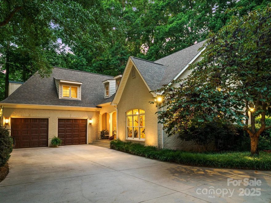 Enjoy your dream retreat, nestled in a lush, wooded oasis offering relaxing privacy & serenity. This architectural gem features a spacious open-concept design, elegant crown molding & hardwood floors. The gourmet kitchen is equipped w/ ss appliances, double ovens, a grand island & breakfast bar...a chef’s paradise. The living area, centered around a charming wood-burning fireplace & flooded w/ soft natural light from expansive windows. The main level master suite boasts a ensuite bathroom & TWO walk-in closets. Step outside to a screened porch, a patio w/ a stone fireplace & built-in natural gas grill, ideal for unforgettable gatherings. With a spacious two-car garage, this cozy larger-than-it-appears haven awaits new owners. Recent upgrades include a new roof, HVAC, & gutter guards (all 2024). Love a pristine yard without the mowing? A acceptable offer includes a Husqvarna Automower & Home warranty. Agent is owner; pre-listing inspection completed. Fall in love—schedule a viewing!