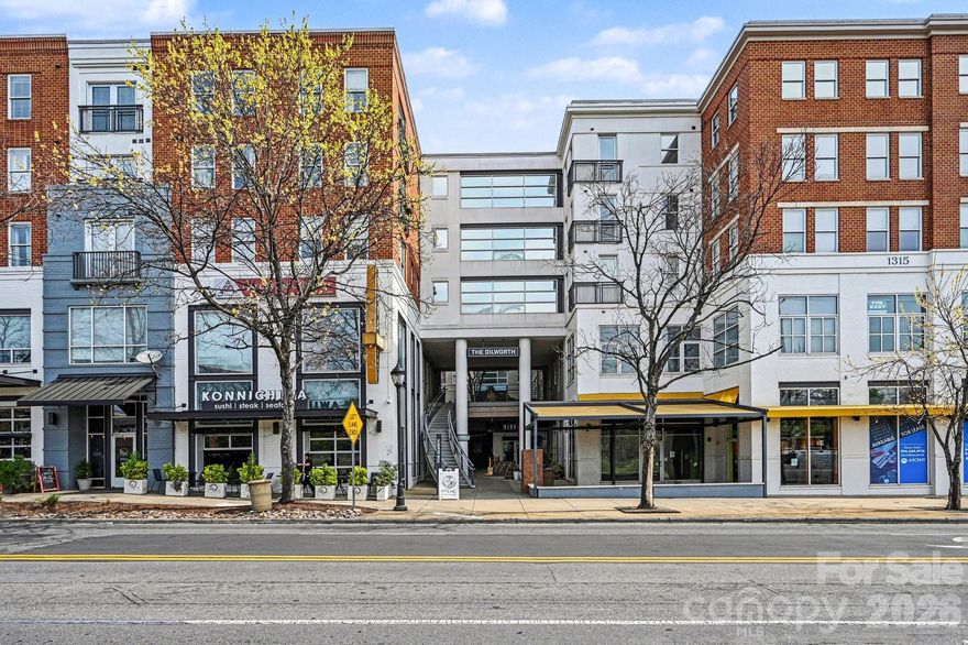 Sophisticated Urban Living in the Heart of Dilworth! Nestled between Scott Avenue and Kenilworth Avenue in the heart of Dilworth, a condo of this size doesn’t go up for sale often. This 2-bedroom, 2-bathroom front-facing mid rise condo spans 1,610 square feet (one of three units – the largest in the complex), delivering exceptional comfort in an unbeatable location.

The home features all hardwood flooring and updated appliances. Soaring 9-foot ceilings and an open floor plan create a bright, airy atmosphere. Master bedroom has a large walk in closet and master bathroom boasts two sinks, garden tub and shower. A versatile flex space off the main living area serves perfectly as a library/home office, dining room, or study. The living room opens to a private Juliette balcony overlooking East Boulevard. Two dedicated private garage parking spaces complete the package.

Building amenities include a fitness center and a rooftop terrace with gas grills — perfect for entertaining or watching Charlotte's skyline.

Steps away from 20+ restaurants, two grocery stores, Freedom Park, Atrium Health, and quick access to Uptown. This is Dilworth living at its finest.