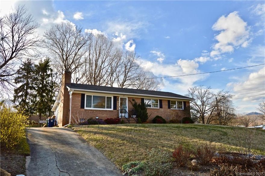 Wonderfully located in Parkway Forest this solid brick ranch will make a great home for first time home buyer or investor.  Close to the VA hospital, downtown Asheville and the Blue Ridge Parkway.  Recently renovated baths, updated grounded wiring, refinished floors, sweet laundry room and great pantry.  A great fenced spacious backyard, Sunroom, patio, and storage building!  Great mountain views year round.  Grounds have blueberry and blackberry bushes and lots of perennials. This will go fast.