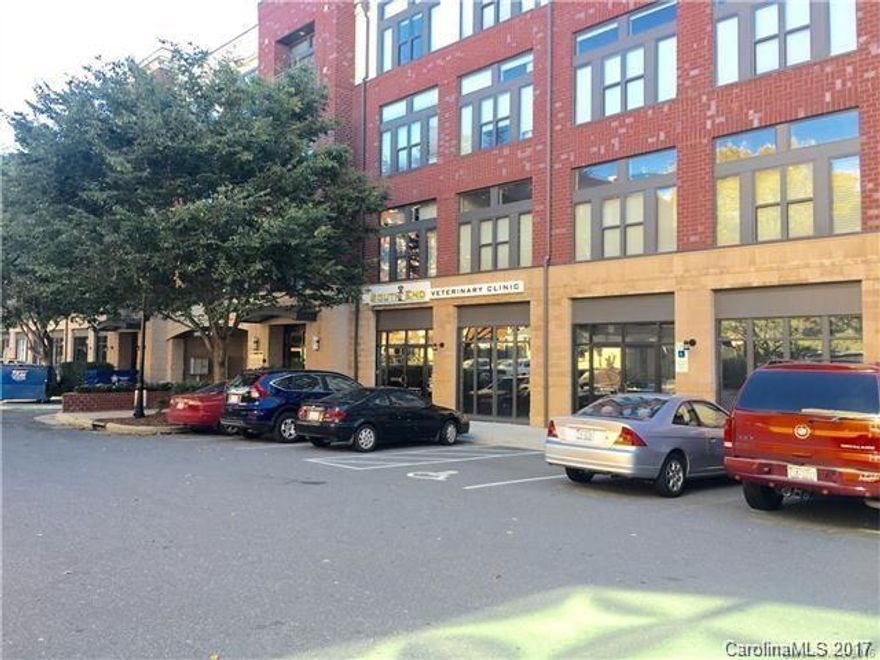 Loft unit located in the heart of Southend.  Walk to restaurants and amenities.  Unit is on the first floor with view of the courtyard.  Hardwood floors throughout.  Kitchen has granite counter tops and eat in bar.  Refrigerator and washer and dryer.  Secure access into the building.  Application will be required by the owner.