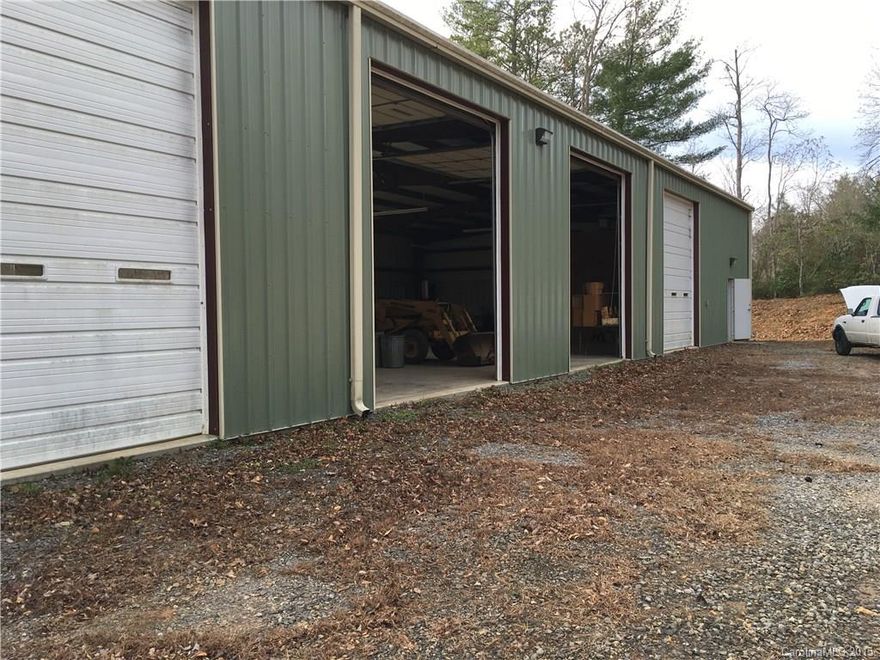 Metal warehouse for LEASE - 50 x 100, 5000 SF of insulated (doors and walls) space. 4 drive in doors (12 x 14) for drive-thru convenience. Perfect for a welding shop. Exterior shed wired for air compressor. On approximately 1 acre of level space for easy access and turn around for large trucks. Small office, storage loft area, full bath, washer/dryer hookup for stackable. Single phase power. Modified Gross Lease.