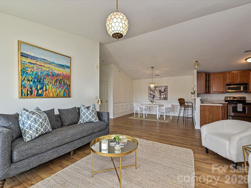 Stunning 3 bedroom/2 bath third floor light-filled condo in the heart of Ballantyne.  Original owner and meticulously maintained. Unit is freshly painted, updated Laminate Wood Flooring, new crown molding in 2nd bedroom as well as wainscotting in dining room and study/3rd bedroom. This unit offers both comfort and convenience. The open-concept layout offers a spacious great room that flows seamlessly to a private, covered porch overlooking mature trees—perfect for relaxing or entertaining.  A split-bedroom floor plan provides privacy, featuring a spacious secondary bedroom, full hall bath, and a separate study or office with peaceful wooded views—ideal for working from home or used as a 3rd bedroom. Oversized primary suite includes a large walk-in closet and an ensuite bath with an extended vanity, double shower, and linen closet. Additional highlights include updated lighting and ceiling fans, a walk-in laundry room with built-in shelving (washer and dryer included), a dedicated storage unit on patio. Enjoy easy access to Copper Ridge amenities just steps away, along with unbeatable convenience to I-485, Ballantyne Bowl, shopping, dining, and grocery stores. An exceptional home in a prime Ballantyne location.