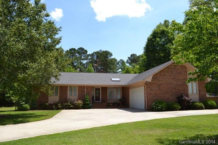 Great ranch home on 2.0 acre lot! 3 Bedroom 2 Bath home has lots of living space.  Large great room has vaulted ceiling and beautiful stone fireplace.  Kitchen has eating area and pantry.  Oversized lot offers great outdoor living with above ground pool, huge tiered deck, and wired storage building.  A Must See!!