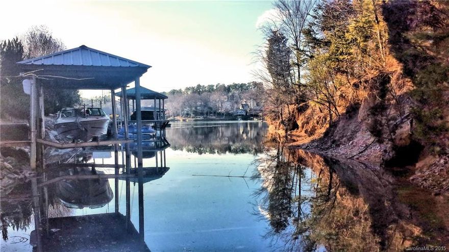 Great waterfront/water-view lot located in Fort Mill, SC. This lot is located in the River Lake community just off Dam road. River Lake is a small secluded subdivision located 5 minutes from shopping and dining in Baxter Village or Tega Cay. Lot is on a cul-de-sac, is wooded, and nestled in a quiet cove opening to a wide channel, great for boating and water sports. The lot is dock-able and already has a permit. 

This lot is also listed as a to be built home under MLS 3147652.