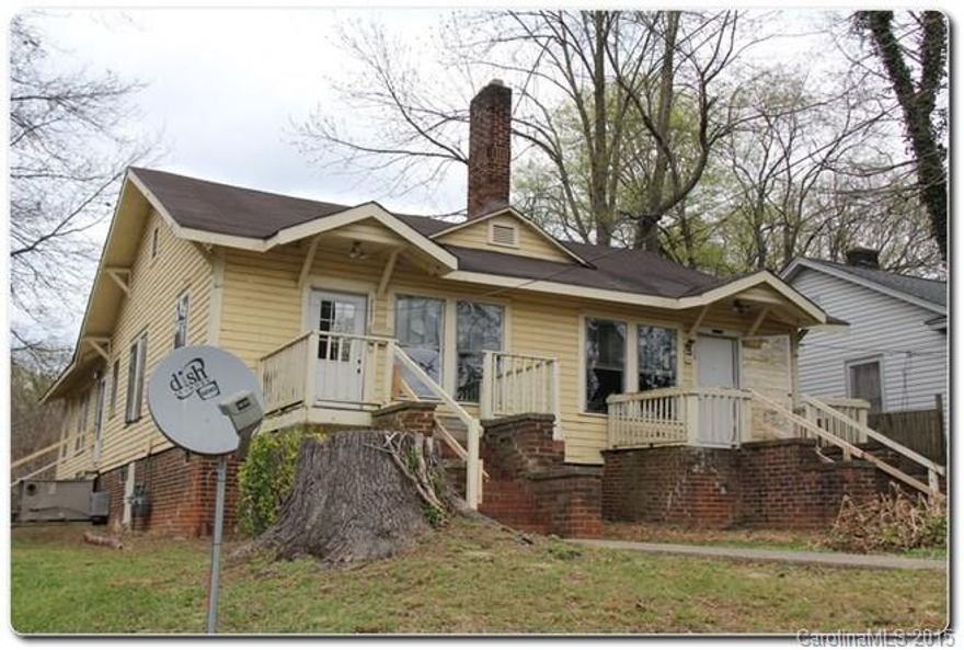 Duplex located close to Uptown Charlotte close to all the shopping and major highway. Each unit has 3 bedrooms and 1 full baths. Features brick fireplace in the bright living room, french doors to the dining area/extra room, spacious kitchen with lots of cabinet space! Lots of potential to be a great rental property. Priced way below the assessed value!