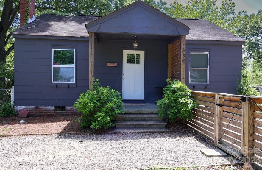 Investors and Visionaries, check out this adorable home in Rock Hill. Fenced double lot.  Updated Bathroom, Windows, HVAC (2020) and Hot Water Heater (2019).  Please note that the Utility room was added by a previous owner and not counted in heated square footage. Greenhouse and chicken house stay.   Property sold AS IS.