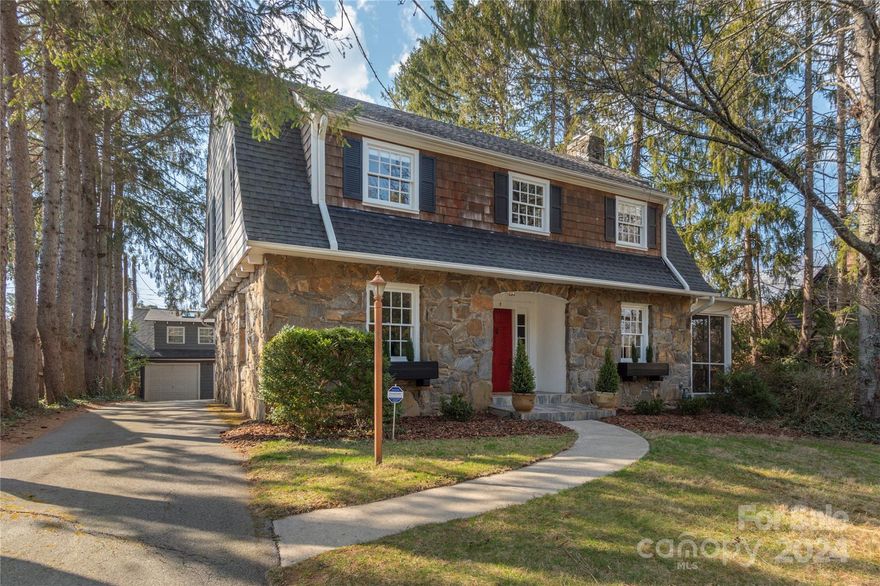 Constructed in 1927, this renovated Dutch Colonial boasts a historic presence in Lake View Park as an initial showcase home for the1920s lakeside community development. It features 4 bedrooms and 3.5 baths, offering four wood-burning fireplaces, a gourmet kitchen, and a spacious screened porch. The owner has renovated it, integrating carefully selected reclaimed elements, such as timber beams and flooring, a clawfoot bathtub and farmhouse sink, vintage lighting, and a variety of decorative details that contribute to the house's inviting atmosphere. The outdoor patio includes a sizable fireplace and hot tub, while the detached two-car garage contains an office/studio above. There's also a full attic and a partial basement, providing plenty of storage options. The electrical system was upgraded in 2021 along with other functioning systems of the house.