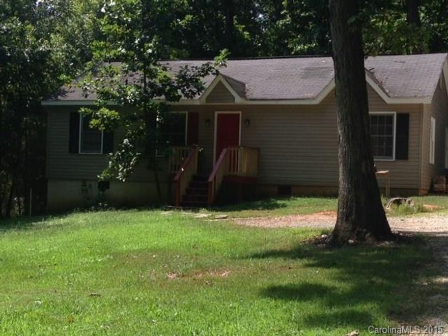 Attention Investors, currently rented month to month with tenant in place. 3 bedroom/ 2 bath home on over a half-acre lot. Nice private yard with mature trees.