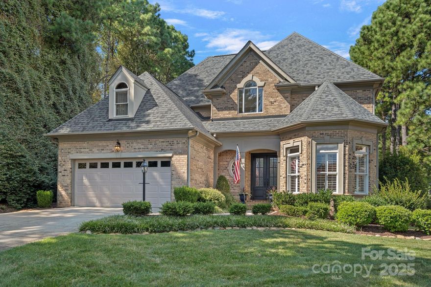 Just the right home in The Peninsula golf community. Beautifully maintained 3361 SF, nestled into a quiet cul-de-sac, this 4 bed, 4.5 bath home offers a main-level primary suite with an updated bath and custom walk-in closet. Features include refinished hardwoods, new GE stainless appliances, a striking Clark Hall steel front door, and a Restoration Hardware dining room chandelier. The highlight is the outdoor living room with a wood-burning fireplace, built-in grill, and beverage center - designed for year-round enjoyment. 
Upstairs, three en-suite bedrooms and a family room loft provide space and flexibility. EV charger, custom garage cabinets, garage epoxy floors, new carpet, fresh paint, and updated lighting complete this move-in ready home just minutes from The Peninsula Club and the Safe Harbor Peninsula Yacht Club. Here, every day feels like a retreat in one of Lake Norman's most desirable locations. Your next chapter begins here.
