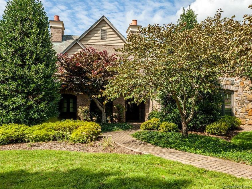 A beautiful European townhome on the 9th green at The Cliffs at Walnut Cove. Tuscan inspired interior with 10 to 14 ft ceilings. Live like a single family home. Library with floor-to-ceiling cherry walls and bookshelves. Southern view of the mountains.