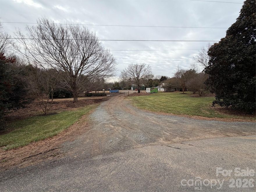 Property for sale near Concord offering 2.4 acres of mostly open ground with excellent accessibility and flexibility for a variety of uses. With approximately 250 feet of road frontage on Bradford Road and positioned on a quiet dead-end road, this tract provides both visibility and privacy.
The property includes two metal buildings formerly used as a lawn care shop, a storage shed with double walk-in doors, and two shipping containers—ideal for equipment storage, small business operations, or future improvements. Utilities include power at the road, Spectrum internet, and telephone service at the road, making setup straightforward.
Conveniently located just minutes from Hwy 73 and Interstate 85, and only 10 minutes from Concord, this property offers strong potential for investors, contractors, or business owners looking for space in a growing area.