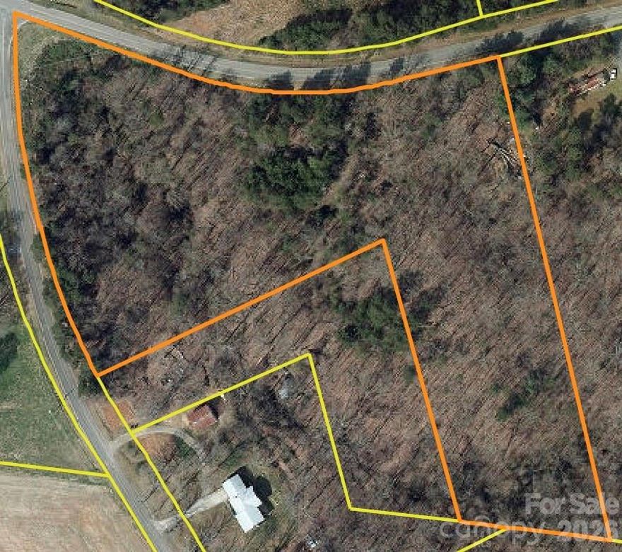 This 7.18-acre tract in the countryside of Vale, NC, is priced affordably at $85,000. Boasting a peaceful wooded landscape with substantial road frontage for easy access. Surrounded by the charm of rural living, this property is perfect for a private homesite, recreational use, or a country retreat. Its natural setting provides seclusion while remaining conveniently accessible.