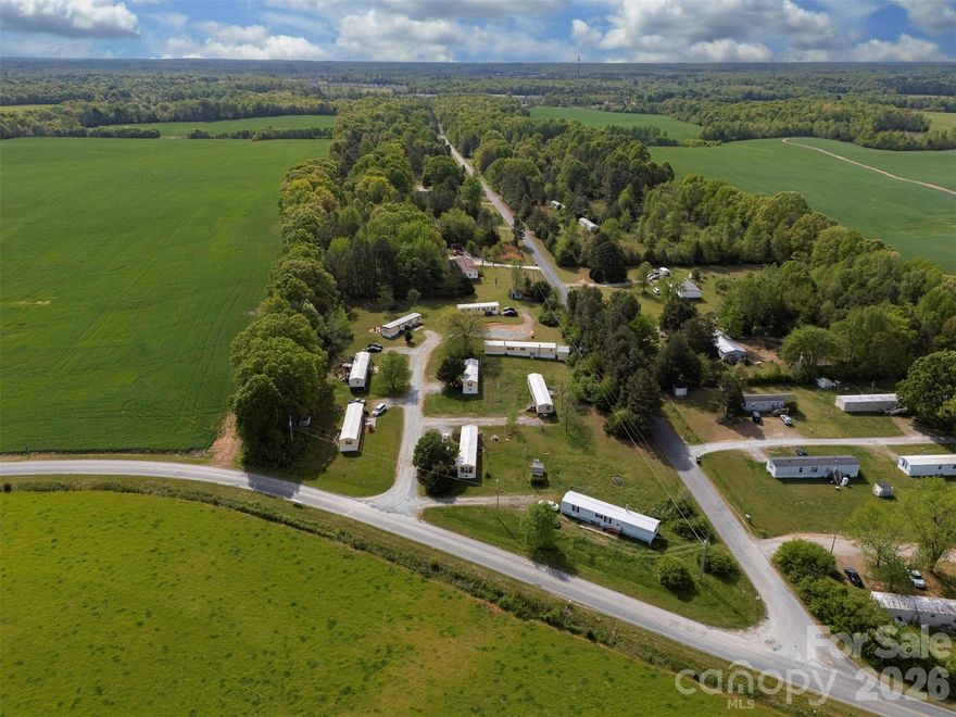 Wonderful investment opportunity!  This nine unit park is sitting on just under 4 acres with beautiful mature trees.  It has approximately 428 feet of frontage on Roscoe Howey Road to the north, and it is bordered to the west by Porter Drive.  It is an outstanding location - surrounded by picturesque countryside and serene views.  Plus, it is still very convenient to shopping, restaurants, and employment opportunities with Waxhaw being less than 6 miles away, downtown Monroe 6.7 miles, and 5 miles to Wesley Chapel Village Commons.  It is located in sought after Union County school districts.   

The park is made up of two parcels 06-150-039 and 06-150-038.  All nine mobile homes are park owned.  Renters provide their own furnishings including washer & dryer, refrigerators are park owned.  The property also consists of four storage buildings, and an insulated pump house that affords extra storage.  A shared 150' deep well serves the whole park, pump was just replaced in 2024.  Each unit has its own septic tank.  The tenants are responsible for mowing their own yards.  Community has two street lights.

The current owners have enjoyed having this property, and lovingly maintained it including extra plantings.  They have repainted the units every five years, and applied Cool Seal to the roofs every three years.  Owners have a list of reliable vendors that they will share.
This park consistently operates at nearly 100% rented, with an established history of long term renters (average stay of over 5 years), and very quick turnover.  At list price it has a Cap Rate of 6.6%.  The rents are under market value, so there is potential for an even greater return.  *PLEASE DO NOT DISTURB TENANTS.*