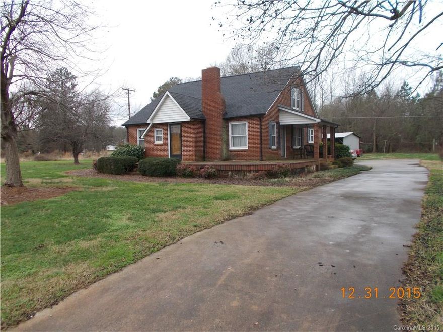 Full brick Cape Cod style house with 2 car attached garage on corner lot with mature trees. 2 parcels (#34659 and # 34652) being sold as one. Most of the flooring in this home has original hardwoods under carpet.
Property may be rezoned as commercial with detailed plans submitted and approved by Lincoln County zoning. 
"Great Location"... 2.5 miles from Hwy's 16/73 intersection. Easy access to Charlotte, Denver and beautiful Lake Norman (property across from Mikes Growers Outlet).