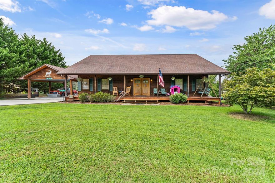 No city taxes! Welcome to this beautiful wood home, with loads of character, sitting on 2.32 acres. Beautiful green and private lot. This home has three spacious bedrooms and two full baths. Open concept kitchen, dinning and living space. The gas log fireplace in the living room sets the tone for this rustic home, cozy and inviting. This home has been very well maintained and all one level making for easy living.