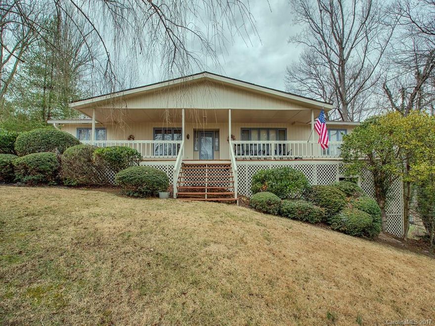 One level living with in minutes to Waynesville.  This home offers 3 bedrooms and 2 bath, Kitchen/Great room with fireplace and formal dinning room. Front Covered porch  and back deck.  Carport and basement workshop all on .71 acres.