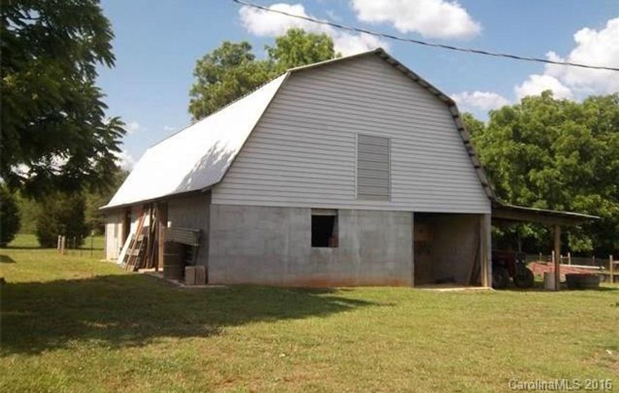 In western part of RoCo, 23 acre farm w 40x56 workshop built in 2010, 10 +- ac fenced pasture, barn w hay storage area. House built 1948, 2200 sqft w expandable areas. Livingroom has beautiful rock fireplace & gorgeous wood floors.  Wildlife, last time I was there I scared 6 deer who had visit!  Turkey & other wildlife abound! Great for horses, cattle, sheep, goats, pigs.  2 hrs to Tryon International Equestrian Center. 4th bdrm not permitted.