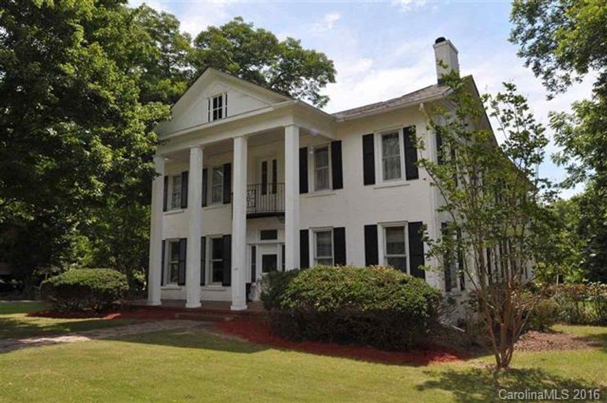 Beautiful 6BR/3.5BA Greek Revival on large corner lot. Elegant hardwoods, crown molding and chandeliers throughout. Updated kitchen and bathrooms. Dinette off kitchen, formal dining room & living room. Separate den & study. Fenced-in backyard with detached 2 car garage and storage room. Close to downtown and I-77, don't miss your chance to own a piece of history!