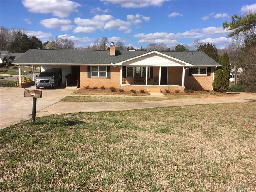 Recently updated home has 5 bedrooms and 2.5 bathrooms.  Brand new kitchen cabinets with granite counter tops.  New flooring and paint throughout. Basement has it's own entrance and has been completely refinished.  It features 2 bedrooms with walk-in closets.  Stove and refrigerator can be added for a great income producing property or in-law suite.  Laundry connections upstairs and down.  Large corner lot has partially fenced in back yard.