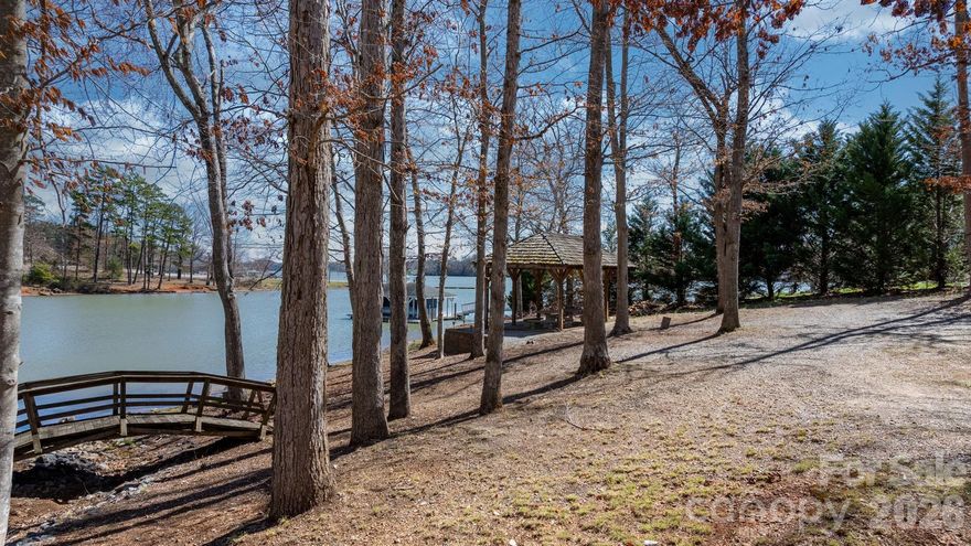 Are you looking to build a home in a beautiful gated community? Take a look at all that Antler Cove in Grace Chapel has to offer. Four lots to choose from, aa with access to Lake Hickory. Development has a Lake side picnic area, green space and access to a private pond. Conveniently located across the street from the public access boat launch. Developer owned and the last to be offered in this prestigious neighborhood.