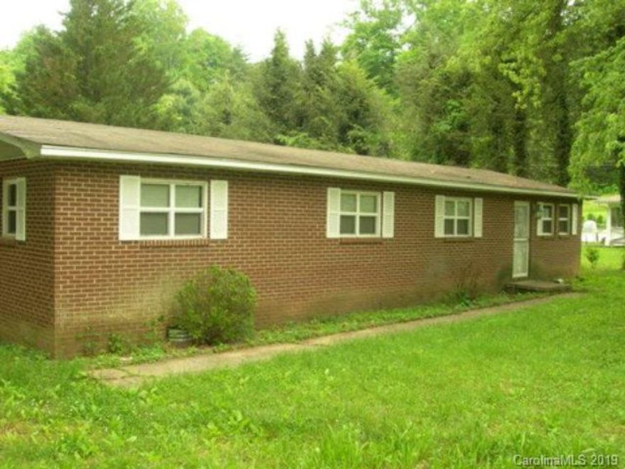 Nice Brick 4BR/2BA with open kitchen/living area and 4 nice size bedrooms.  Backyard is level with plenty of parking.  Nice back deck and gazebo for those quite evenings at home. This property is now under auction terms. Pre-sale bids should be submitted through www.Auction.com online sales event will begin 3/16/2015 and end 3/19/2015.  This property is subject to a 5% buyer's premium pursuant to the Auction Terms & Conditions (minimums may apply).Please note that the commission percentages may change between the pre-sale and auction periods so please contact listing agent to verify exact commission terms. All auction assets will be sold subject to seller approval. Please contact listing agent for details.