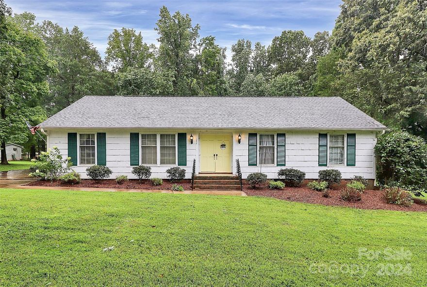 3824 Seneca Place is a charming 3-bedroom, 2-bathroom home with just over 1,500 square feet of flowing living space! Situated in a cozy neighborhood just south of Lake Wylie and on the northern side of Rock Hill, this home is a must see! Having been loved and cared for decades, this 1 story ranch is ready for a new owner to call it home! Located on a private, wooded backdrop, experience space and privacy with over 3 quarters of an acre! Featuring a large parking area for many vehicles as well as an oversized back deck perfect for grilling and chilling. Inside find updated countertops with granite, a flowing floor plan with fireplace in the family room and a lovely front lawn with lots of curb appeal! Don't miss this opportunity to live in a wonderful area at a price most homes can't compete! Make 3824 Seneca a must see on your list TODAY!