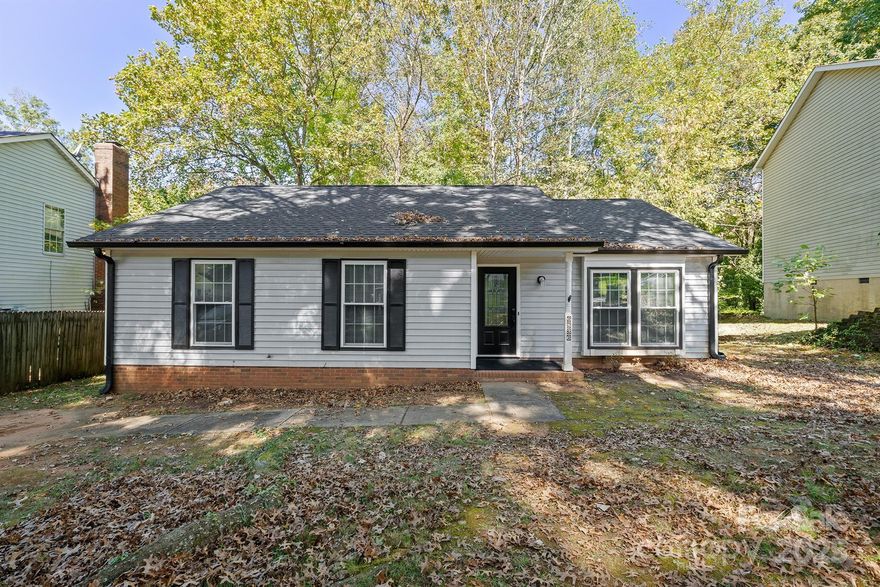 Discover the epitome of serene, single-story living in the desirable Idlewild Brooke community with this beautiful ranch-style home. Built in 1988, this charming 1210 sq. ft. residence offers 3 bedrooms, 2 bathrooms, and a thoughtfully designed open floor plan that maximizes space and natural light. Step inside to find a bright and welcoming interior, accentuated by soaring vaulted ceilings and a seamless flow between the living, dining, and kitchen areas—perfect for both daily living and entertaining. The home has been meticulously refreshed with modern upgrades, including brand-new doors and windows, a state-of-the-art water filtration system, freshly painted interiors, as well as upgraded soffits, gutters, and a shed. Nestled on a generous .395-acre, fully wooded back yard, this property provides a peaceful retreat with no HOA restrictions, ensuring freedom and flexibility. The private driveway accommodates two vehicles, adding convenience to this idyllic setting. Stay comfortable year-round with a replaced efficient central heating and cooling via a heat pump, designed for energy savings and comfort.
Outdoor enthusiasts will love the proximity to nearby walking trails, while families will appreciate the access to top-rated schools and everyday conveniences just minutes away. Perfectly suited for first-time homebuyers, growing families, or astute investors, this move-in-ready gem combines modern sophistication with timeless charm. Don’t miss your chance to own this exceptional home in a prime Charlotte location.