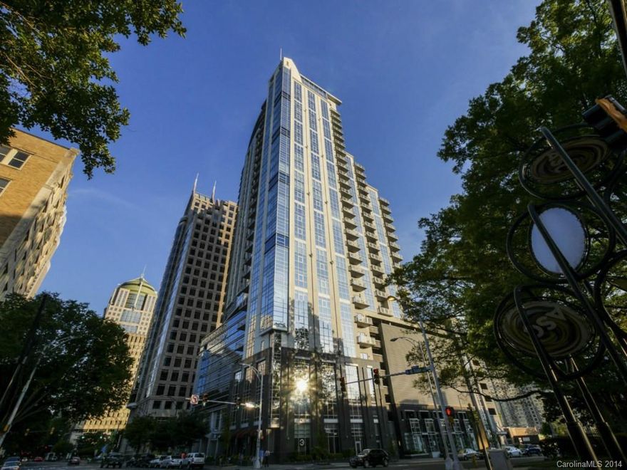 Incredible center city condo with phenomenal views of Charlotte skyline.  Wood flooring, granite countertops and bartop, stainless steel appliances.  Balcony overlooking the BB&T baseball park, Romare Bearden city park & Panther's stadium.  Walk to all center city amenities.  Secure building with assigned parking space.  10' ceilings and a one level, open floorplan.