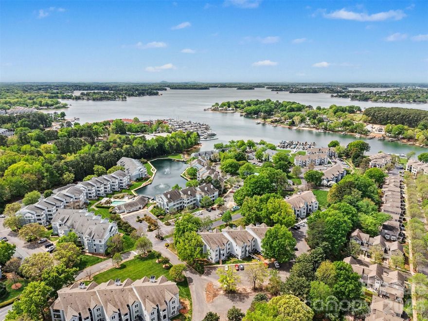 Top-floor 2-bedroom, 2-bath condo in Admiral’s Quarters—one of Cornelius’ premier lakeside communities. This third-floor residence features an open-concept great room that flows seamlessly onto a covered balcony, perfect for morning coffee or evening relaxation. The kitchen overlooks the main living area, creating an ideal space for entertaining. The spacious primary suite offers an ensuite bath and generous closet, while the secondary bedroom and full hall bath provide flexibility for guests or a home office. Enjoy resort-style amenities including an outdoor pool, fitness center, tennis/pickleball courts, clubhouse, playground, and lake access with community boat slips. Ideally located just minutes from Lake Norman waterfront dining, greenways, shopping, and I-77. Recent updates include new exterior siding, windows, and sliding glass doors (2025), as well as new plumbing pipes (2024). Community includes 8 visitor boat slips. Professional photography coming soon.