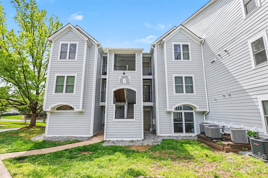 Top-floor 2-bedroom, 2-bath condo in Admiral’s Quarters—one of Cornelius’ premier lakeside communities. This third-floor residence features an open-concept great room that flows seamlessly onto a covered balcony, perfect for morning coffee or evening relaxation. The kitchen overlooks the main living area, creating an ideal space for entertaining. The spacious primary suite offers an ensuite bath and generous closet, while the secondary bedroom and full hall bath provide flexibility for guests or a home office. Enjoy resort-style amenities including an outdoor pool, fitness center, tennis/pickleball courts, clubhouse, playground, and lake access with community boat slips. Ideally located just minutes from Lake Norman waterfront dining, greenways, shopping, and I-77. Recent updates include new exterior siding, windows, and sliding glass doors (2025), as well as new plumbing pipes (2024). Community includes 8 visitor boat slips. Professional photography coming soon.