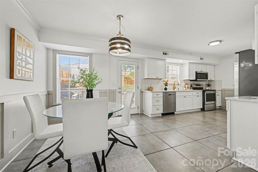 Beautifully updated and truly move-in ready, this gorgeous two-story home offers the perfect blend of modern upgrades, functional design, and inviting living spaces. Featuring 3 spacious bedrooms and 2.5 recently renovated bathrooms, this home delivers both comfort and style throughout.

Step inside to discover a thoughtfully designed floor plan enhanced by LVP flooring, fresh interior paint, and elegant crown molding that extends throughout the entire home, creating a polished and cohesive feel. The living room is warm and welcoming, centered around a cozy fireplace that makes the perfect focal point for relaxing evenings, and the stunning accent wall adds a luxurious touch.

The heart of the home is a standout feature, showcasing elegant wainscoting in the dining area, stunning quartz countertops with a matching quartz backsplash, and abundant brand-new cabinetry for exceptional storage and organization—ideal for both everyday living and entertaining.

Upstairs, the generously sized bedrooms provide comfortable retreats featuring elegant accent walls and ceiling fans, while the updated bathrooms reflect high-end finishes and attention to detail. The spacious primary bedroom features a modern accent wall, an abundance of natural light, a large walk-in closet and a functional ensuite.

Outdoor living truly shines in this property! The private, fully fenced-in backyard has been transformed into an entertainer’s oasis, complete with an oversized paver patio and a built-in fire pit with a dedicated seating area—perfect for hosting gatherings or enjoying peaceful nights under the stars.

The spacious 2-car attached garage has been recently painted and features new epoxy floors. This property is located in the peaceful Bristol Park community, offering unbeatable convenience just minutes from I-77, with easy access to shopping, dining, schools, and everyday necessities.

This turnkey property checks all the boxes: style, space, location and value. Don’t miss the opportunity to make it yours. Schedule your private showing today.