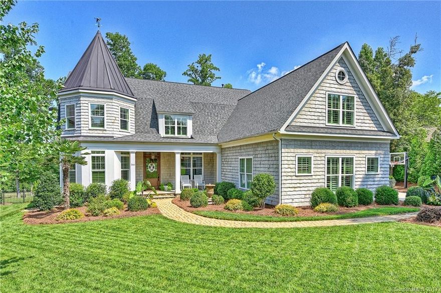 Charming home in Springfield golf course community. Light-filled flowing floor plan. All white kitchen w/built-ins, marble and granite c-tops. Generous breakfast area. Great room features fireplace and built-ins, French doors to terrace. Master en-suite on main. Upper level with 3 large bedrooms (one with private bath, two BR's with jack/jill bath); media rm, bonus rm, exercise rm. Lots of storage. Unique moldings throughout, gleaming HDWDs, Covered terrace with fireplace and golf course view.