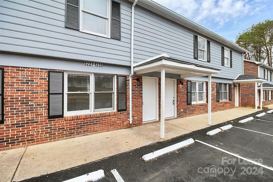 Just renovated townhome in central Gastonia. Conveniently located near the Greenway, I-85, and many dining options. Updated townhome with neutral color scheme and open floor plan. Main level includes half bathroom and new kitchen with refreshed countertops, appliances, and cabinetry. Luxury final plank flooring throughout both levels. All bedrooms located on second level with bonus closets in primary bedroom, and a brand-new bathroom with modern fixtures and stylish vanity. Water, landscaping, and trash pickup included in the price of rent. Complex has been recently purchased with plans to upgrade all buildings and exteriors. Schedule your tour today!
$50 owed monthly for water.