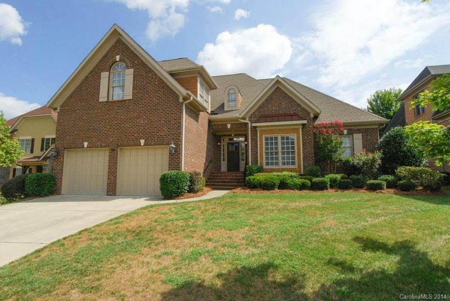 Custom built home with lots of upgrades.  Hardwoods throughout most of the main level, stainless appliances, fresh interior paint, new carpet, huge playroom, loads of attic storage, 2 fireplaces, covered terrace, first floor master suite and lots of other features.  Spotless home and ready to move in.  The yard maintenance is taken care of by the HOA.  House has been preinspected and the repairs are complete or  are underway.