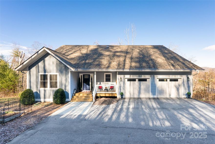 Nestled within a private community, this well-maintained home sits on 1.81 acres featuring a spacious open floor plan, perfect for modern living and entertaining. Skylights enhance the already sunlit interior, creating a warm and inviting atmosphere. Enjoy peaceful seasonal mountain views and exceptional privacy surrounded by natural landscape, while remaining conveniently close to local amenities. The unfinished basement offers abundant additional storage and flexible space to suit your needs or lifestyle. Modern conveniences include a Level 2 electric vehicle charge for fast and efficient home charging. Thoughtfully designed for elevated comfort, this home combines privacy, light-filled interiors, perfectly crafted for effortless everyday enjoyment.