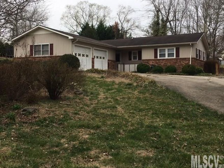 FORECLOSURE TO BE SOLD "AS-IS, WHERE-IS."  Nice Ranch home with 3 bedrooms, 2 baths. Home appears to be in very nice condition. Spacious LR with fireplace. Replacement windows. Double garage on main level. Corner lot with nice landscaping.