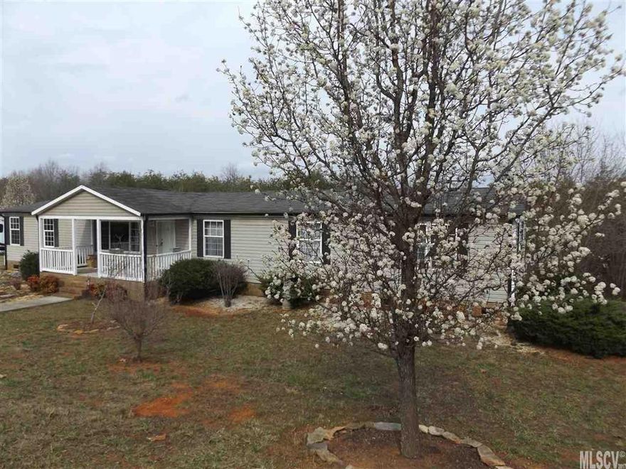 Private, spacious, and ready for a new family! Located in the Fred T. Foard School District, this well-maintained manufactured house has 2280 square feet and features a split bedroom plan with four bedrooms, living room and a den with a fire-place, and lots of storage. New carpet in the main living area. Recent survey completed marking corners.