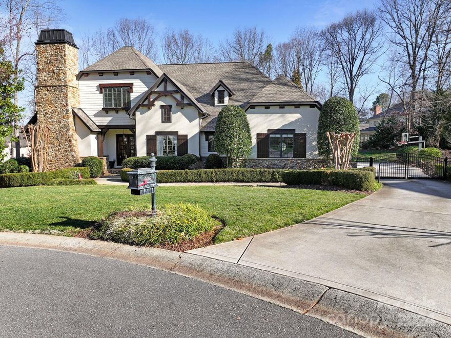 Don't miss this custom built home with a very large open floorplan on a generous size lot. Beautiful coffered ceilings. Beams and stone accents adorn this main floor living space lending to its charm. You can't help but notice the floor to ceiling fireplace and the refinished (clearcoat) beautiful walnut floors. Notice the stairs leading to the upper level as they are discretely tucked away, and not intruding into the living space. Upper level 4th bedroom is a perfect guest room, with extra office, media room, or workout room,  Seasonal views of LKN. Lots of privacy in the backyard. Great outdoor entertaining area and paver patio. Outdoor cooking area. Plenty of outdoor space for the family and pets. Oversized garage with plenty of room for motorcycle/bikes etc.