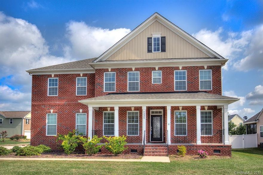 This 5 BR all brick home comes w/guest suite on 1st floor, 3 bedrooms PLUS a HUGE Bonus/5th Bedroom upstairs.  Check out the beautiful main level floors (recently installed wood look tile downstairs for durability & beauty).  Kitchen incl: upgraded granite counters & cabinets, formal living rm/office & dining rm; large great room makes for all kinds of entertaining possibilities.  Corner lot with level large fenced back yard.  Neighborhood Pool & Playground, close to shopping, restaurants,etc.