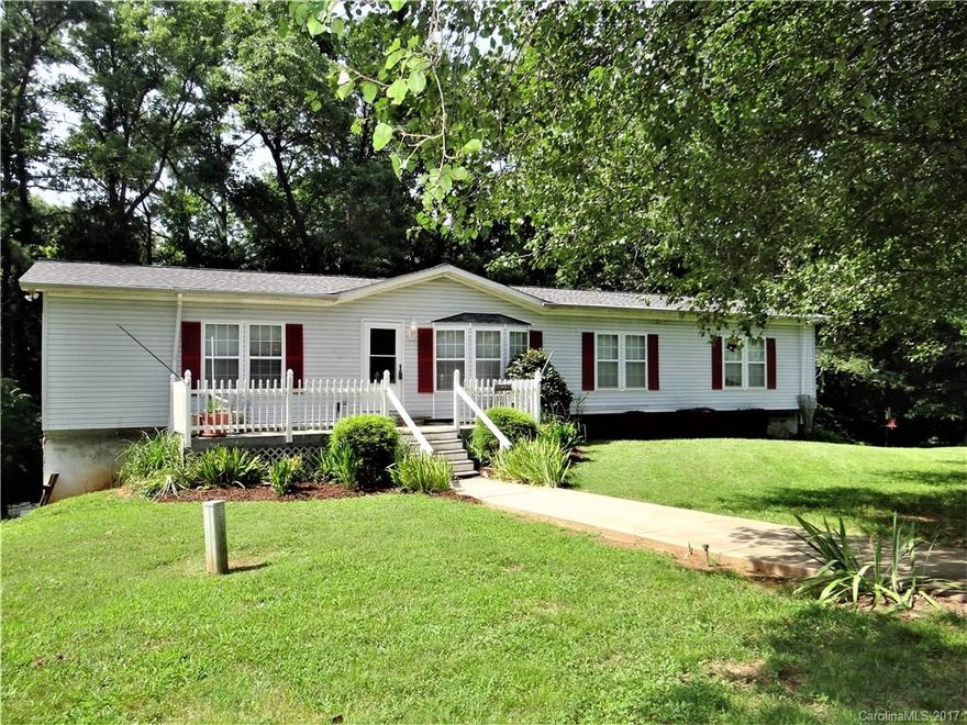 ATTENTION INVESTORS! MOTIVATED SELLERS BRING ALL OFFERS! SELLING AS IS! Home needs some work & updating but is priced to reflect condition. Gorgeous wooded lot with approximately 2.61 acres. 1,910 sq. feet of heated living space upstairs & an additional 1,768 sq. foot unfinished basement with a 2-car garage door. This home will provides that "country living" feeling you've been looking for, all within 15 minutes of Mooresville! Washer & Dryer may convey with acceptable offer.