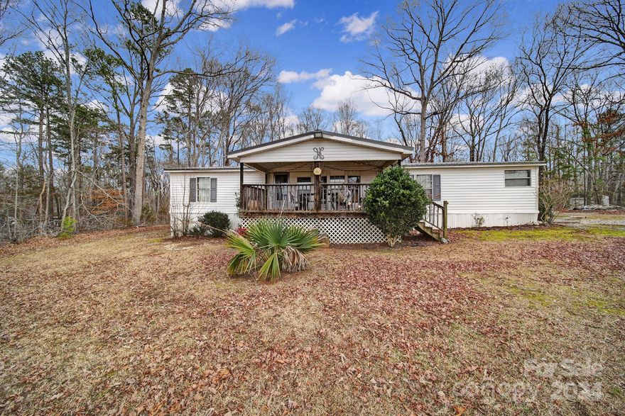 Buford Community! Welcome to this spacious 3 bedroom, 2 bath home. This property has right under 3 acres of land and plenty of room inside to spread out as well. You will love all the space inside. Come see all the possibilities this home has to offer. Book your showing today!