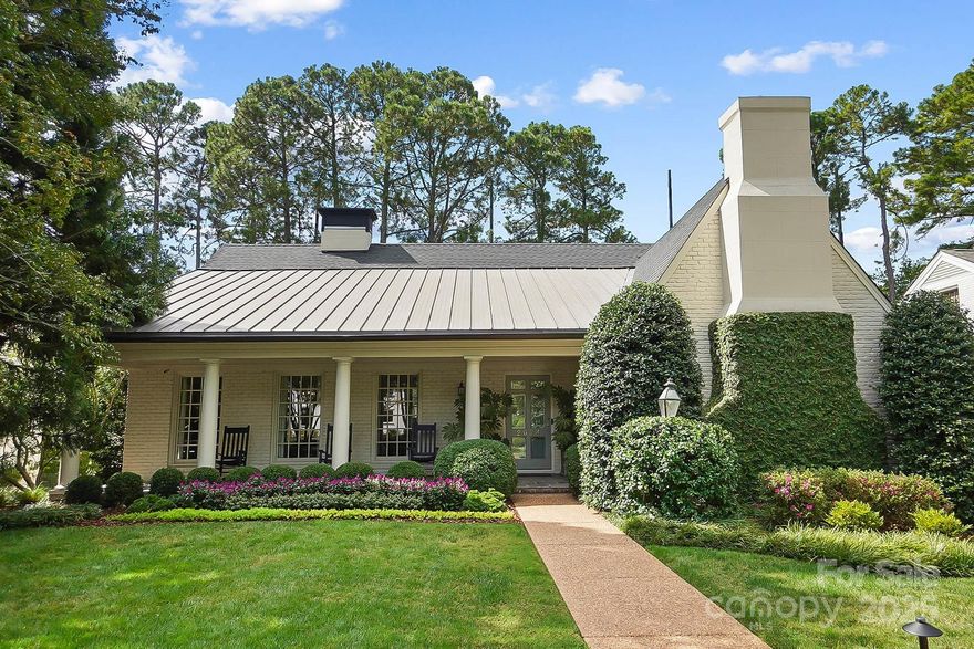 Welcome to this timeless Myers Park residence, an elegant 4,200 sq ft home that feels straight out of the pages of Southern Living. Perfectly positioned overlooking the golf course, it blends classic Southern charm with refined modern living. Step inside to a warm, inviting layout designed for both everyday comfort and unforgettable entertaining. The heart of the home is the kitchen with a lovely keeping room, cozy fireplace, and breakfast room, while the formal dining and living areas set the stage for gracious dinner parties and holiday gatherings. An inviting screened porch with Cumaru hardwood floors on the second level offers year-round enjoyment and sweeping golf course views. Upstairs, an entire level is devoted to the ultimate primary retreat. Wake up to a sun-filled sitting room with a wall of windows overlooking the greens, enjoy a morning coffee from your private beverage center, and luxuriate in two expansive walk-in closets. The walkout ground level offers a versatile family room, en suite bedroom ideal for guests or multigenerational living, and seamless access to a spacious backyard featuring an open patio and covered patio designed for memorable gatherings, along with more stunning golf course views. Every detail of this home has been crafted for elegance, comfort, and an unparalleled Myers Park lifestyle.
