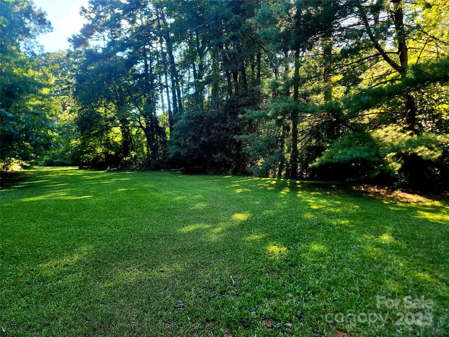 Large and beautiful mid-century neighborhood lot 18 minutes from downtown Charlotte.  Neighborhood is nestled between Gar Creek Nature Preserve and Latta Nature Preserve and just minutes from Long Creek Greenway.  Abundant wildlife yet close to what Charlotte offers.  About 20 minutes to Charlotte airport, 20 minutes to Concord airport, 20 minutes to Whitewater Center, 20 minutes to Davidson College, 20 minutes to UNCC.  Located about 6 miles south of Lake Norman, easily access highway 16 towards Hickory or I-77 towards Mooresville.  Listing agent is owner/seller.