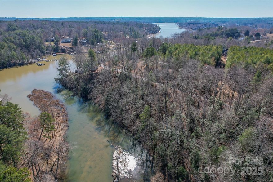 Opportunity to own lakefront 1.4 Acre building lot with 349 feet of direct lake frontage but not dockable. You can launch kayaks, canoes and other watercraft not requiring a dock. Quiet neighborhood is a great place to build a perfect getaway home.