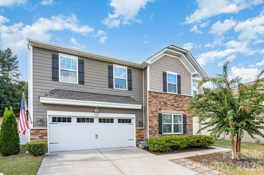 Agent Owned. Move-in ready! NEW CARPET!  Fresh interior paint. This beautiful, well-maintained home is ready for you! The main level features stunning hardwood floors, an open floor plan, and a cozy family room with a gas log fireplace. A large TV with soundbar is included for your enjoyment. The kitchen is a dream with 42” tall cabinets, stainless steel appliances, granite countertops, a spacious island, and a generously sized pantry—perfect for cooking and entertaining. Step outside to your private, fenced backyard with no neighbors behind you. Upstairs, you’ll find four spacious bedrooms, a loft, and a convenient laundry room. The master suite offers comfort and style, while the bathrooms feature tile flooring. The community has something for everyone! Enjoy access to pools, sports fields, a fitness center, playgrounds, and scenic walking trails around little ponds. The popular Carolina Thread Trail also runs right through the neighborhood, making it easy to get outside and stay active.