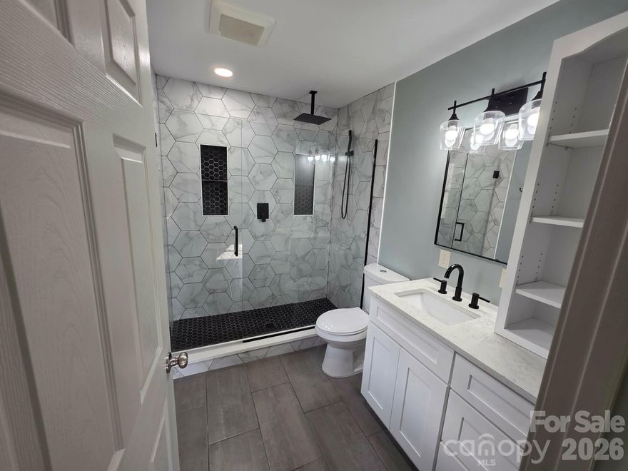 Welcome home to this charming brick 3 bedroom, 2 bathroom property nestled on a spacious 0.51+/- acre lot just outside the city limits of Thomasville. Freshly painted and move-in ready, this home offers comfortable living with a welcoming great room area featuring recessed lighting, creating a bright and inviting space perfect for gathering. The ceiling fans in the bedrooms add comfort and efficiency.

Relax year-round in the sunroom, complete with its own mini-split system for heating and cooling and walls of sliding windows that allow our beautiful Spring time fresh air and natural light to pour in. Step outside onto the 10x12 deck, perfect for grilling, entertaining, or enjoying the peaceful surroundings. With a generous yard and the convenience of being just outside the city limits, this property offers the perfect blend of comfort, space, and quiet living.