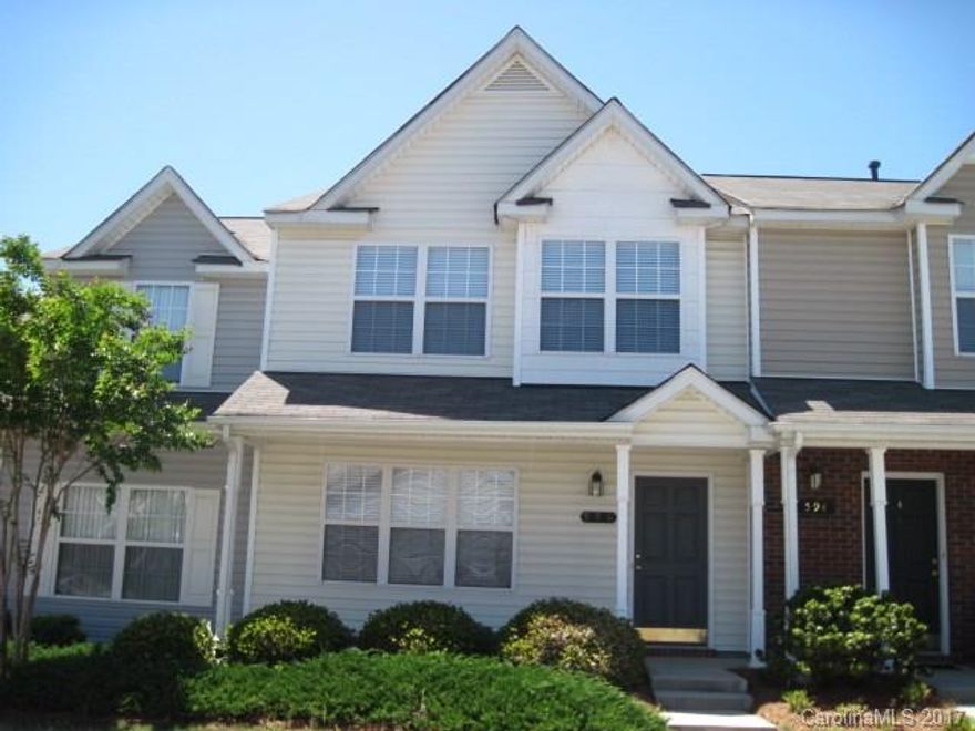 This townhome is conveniently located near 77, Carolina Place Mall and 485. Living room has a fireplace and the community has a pool!