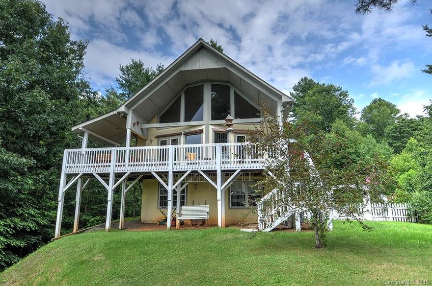 A Must See.Cottage comfortable, with lots of room.Sitting on 1.97 ac w/fantastic views!Cathedral ceiling, rock f/p, wood floors. Great room windows bring in the VIEW!Kitchen w/ bkfst bar is so functional.Master b/r suite is amazing, with loft sitting area, soaker tub & shower. plus a balcony! 2 bedrooms are so cute .Huge
den& office downstairs. Barn/workshop & utility shed. Oversized 2-car garage. Landscaped to perfection.
Whole house outside is being painted! PRICED TO SELL
